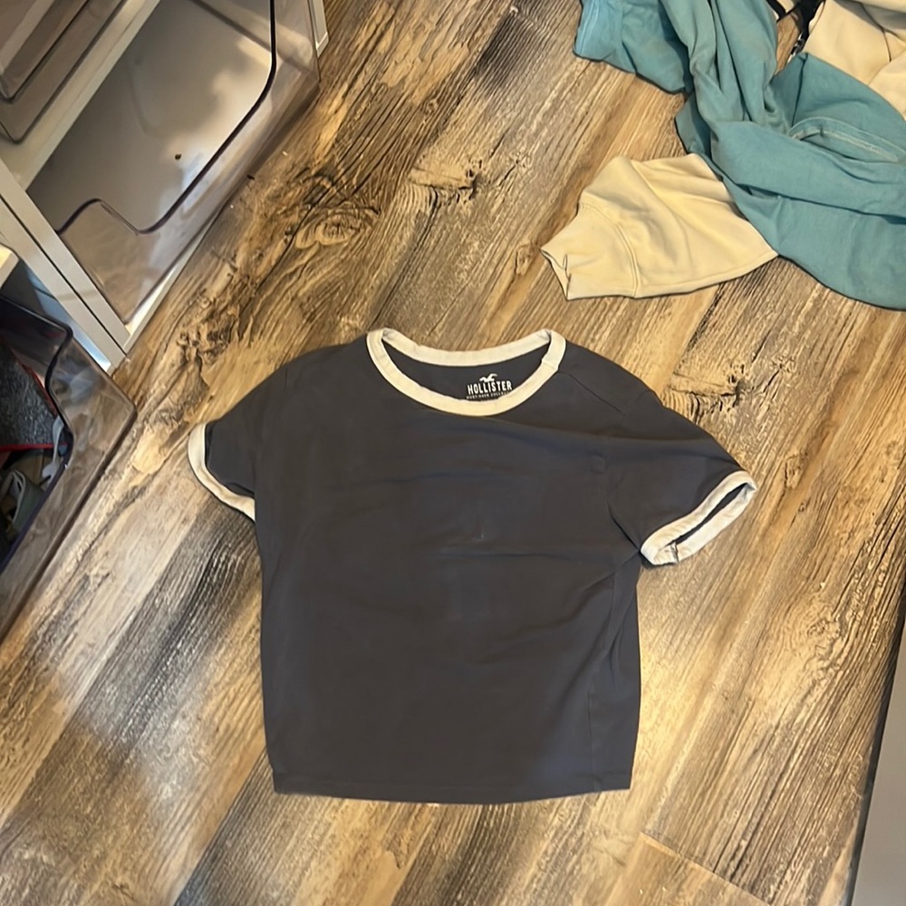 Cute blue hollister baby tee!! Barley been worn.